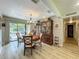 Dining room featuring a wooden table set and a large cabinet with a view of the yard at 305 West Lake Faith Dr # 139, Maitland, FL 32751
