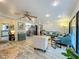 Spacious living area with elegant decor, hardwood floors, and a glimpse of the kitchen, offering a comfortable living space at 305 West Lake Faith Dr # 139, Maitland, FL 32751