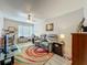 Cozy living room featuring contemporary décor, a ceiling fan, and lots of natural light at 305 West Lake Faith Dr # 139, Maitland, FL 32751