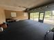 Large garage space with carpet and a screen door at 3540 Garland St, Mulberry, FL 33860