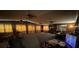 Spacious living room featuring multiple ceiling fans and several large windows at 3540 Garland St, Mulberry, FL 33860