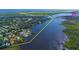 Stunning aerial view of property with waterfront access and lush greenery near Ponce Inlet at 418 Acacia Cir, Port Orange, FL 32127