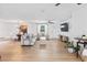 Bright open concept living room with hardwood floors and modern decor at 418 Acacia Cir, Port Orange, FL 32127