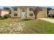 Two-story home featuring a manicured lawn and an attached two-car garage at 4209 Sw 33Rd St, Ocala, FL 34474