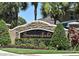 Stone community entrance sign for Summerfield with lush landscaping and mature palm trees at 436 Skyview Pl, Chuluota, FL 32766
