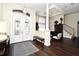 Inviting entryway showcases hardwood floors, decorative glass doors, and elegant lighting at 436 Skyview Pl, Chuluota, FL 32766