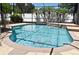 Sparkling in-ground pool features a decorative waterfall and fun tropical-themed decor at 436 Skyview Pl, Chuluota, FL 32766