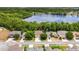 Beautiful aerial view of a lakefront community and neighborhood with lush tree coverage at 447 Kehoe Blvd, Orlando, FL 32825