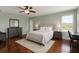 Bright bedroom with stylish furniture, hardwood floors, and large windows offering plenty of natural light at 447 Kehoe Blvd, Orlando, FL 32825