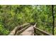 Community boardwalk surrounded by trees and vegetation. Community recreational area at 447 Kehoe Blvd, Orlando, FL 32825