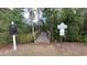 Community lakeside boardwalk surrounded by trees and vegetation. Community recreational area at 447 Kehoe Blvd, Orlando, FL 32825