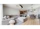 Cozy living space with open floor plan to kitchen & dining, featuring ample seating and natural light at 447 Kehoe Blvd, Orlando, FL 32825