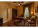 This office features a wooden desk, book case, and a comfortable chair near the window at 447 Kehoe Blvd, Orlando, FL 32825