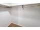 This is a well-lit empty closet ready for storage and organization at 5096 The Oaks Cir, Orlando, FL 32809