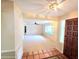 Inviting foyer with neutral walls and tile entryway flowing into the main living space filled with natural light at 5096 The Oaks Cir, Orlando, FL 32809