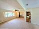 Bright living room with neutral walls, ceiling fan, and views into the entryway and front yard at 5096 The Oaks Cir, Orlando, FL 32809