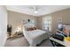 Comfortable bedroom featuring a ceiling fan, a window, and carpet flooring at 51 Seminole Dr, Debary, FL 32713