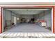 A large open garage providing ample space for vehicles, tools, and various storage needs at 51 Seminole Dr, Debary, FL 32713