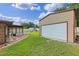 Spacious detached garage with a white door, ideal for extra storage and projects at 51 Seminole Dr, Debary, FL 32713