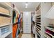 Organized walk-in closet with custom shelving, drawers, and ample hanging space for clothes and shoes at 51 Seminole Dr, Debary, FL 32713