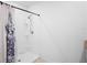 Bathroom featuring a shower with white tile and neutral flooring at 522 Anne St, Deland, FL 32724