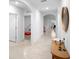 Bright hallway featuring arched doorways and modern decor at 522 Anne St, Deland, FL 32724
