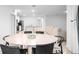 Bright, open-concept living space, with views of the kitchen and living room, perfect for modern living and entertaining at 522 Anne St, Deland, FL 32724