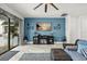 Gathering room with modern decor, ample lighting, comfortable seating, and sliding doors to the outside at 7454 Gathering Dr, Reunion, FL 34747