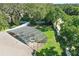 Aerial view highlighting the backyard with screened in pool and the home's landscaped surroundings at 7819 Canyon Lake Cir, Orlando, FL 32835