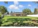 Large backyard showcasing a screened-in lanai, providing a private and comfortable outdoor living space at 7819 Canyon Lake Cir, Orlando, FL 32835