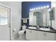 Beautiful bathroom featuring a double sink vanity and walk-in shower at 7819 Canyon Lake Cir, Orlando, FL 32835