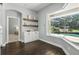 Bright breakfast nook near the kitchen area overlooking the screen enclosed pool and backyard at 7819 Canyon Lake Cir, Orlando, FL 32835