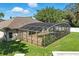 View of the screened-in pool and patio area, ideal for relaxation and enjoying the outdoors at 7819 Canyon Lake Cir, Orlando, FL 32835