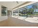 Screened-in pool featuring a waterfall and lush landscaping at 7819 Canyon Lake Cir, Orlando, FL 32835