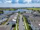 Community with waterfront views, modern townhomes, and convenient parking at 8484 Sperry St, Orlando, FL 32827