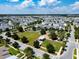Aerial view of a community showcasing a central park and well-spaced homes at 8484 Sperry St, Orlando, FL 32827
