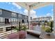 Relaxing balcony with comfortable seating and an view of the community at 8484 Sperry St, Orlando, FL 32827