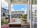 Charming balcony featuring a cozy sitting area and neighborhood views at 8484 Sperry St, Orlando, FL 32827