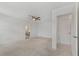 Bright bedroom with neutral carpet and attached ensuite bathroom at 8484 Sperry St, Orlando, FL 32827