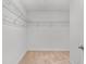 Spacious walk-in closet with carpeted flooring and wire shelving for storage at 8484 Sperry St, Orlando, FL 32827