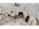Open-concept living room featuring modern furnishings, sleek hardwood flooring, and contemporary design elements at 8484 Sperry St, Orlando, FL 32827
