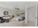 Serene main bedroom featuring neutral tones and a cozy seating area at 8484 Sperry St, Orlando, FL 32827