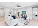 Airy living room with modern furniture, neutral tones, a ceiling fan, and a serene ambiance at 977 Talon Pl, Winter Springs, FL 32708