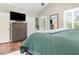 A serene bedroom with hardwood floors, ample natural light, and a minimalist decor at 1033 Mccully Ct, Oviedo, FL 32765
