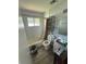 Bathroom featuring tile flooring, bathtub with shower, and vanity sink at 1047 Clay Blvd, Eustis, FL 32726