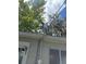 Shows electrical wiring and meter attached to the outside of the home at 1047 Clay Blvd, Eustis, FL 32726