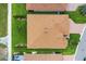 Aerial shot of a home showcasing the roof and landscaping at 1104 Sawgrass Dr, Winter Haven, FL 33884