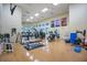 A spacious gym area with exercise equipment and plenty of natural light at 1104 Sawgrass Dr, Winter Haven, FL 33884