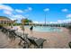 The community pool offers a relaxing setting with ample lounge chairs at 1104 Sawgrass Dr, Winter Haven, FL 33884