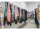 Walk-in closet with extensive hanging storage for clothing at 1104 Sawgrass Dr, Winter Haven, FL 33884